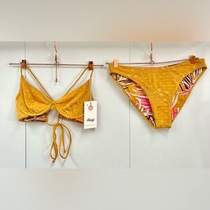 Medium Maaji women’s reversible bikini top and bottom.